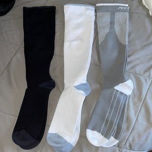 three pair of compression socks